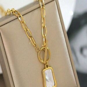 Elegant Gold Necklace with Mother of Pearl Pendant